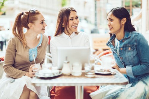 Three women at a business meeting over lunch
