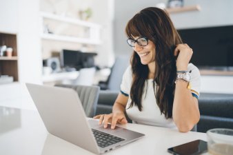 happy woman on computer