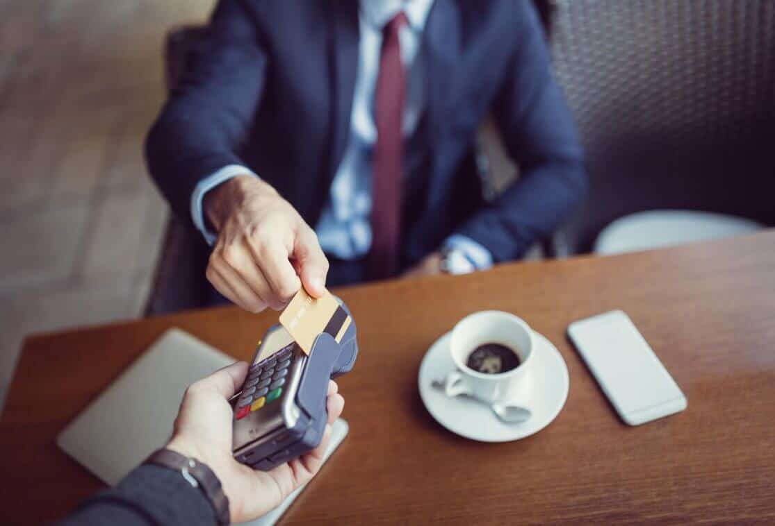 Man paying with credit card