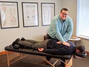 Matt Jackson working with a client at Elevation Chiropractic Center