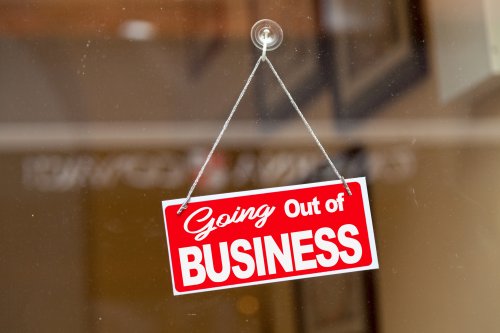 Going out of business sign hanging on door