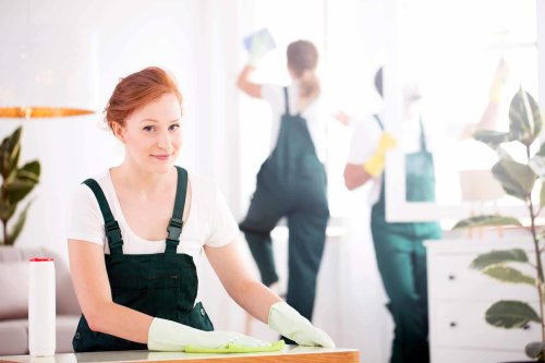 Female small business owner managing her cleaning crew