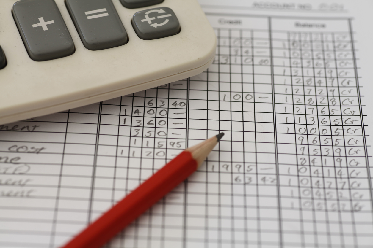 Accounting Ledger Closeup with calculator