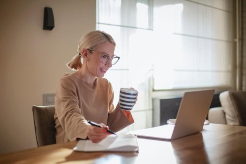 Woman working from home with coffee