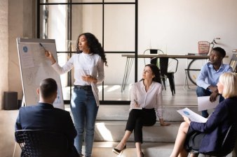 Woman providing diversity training to employees