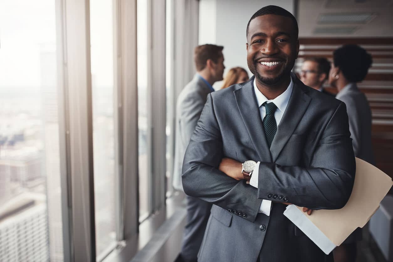 Black Businessman smiling post-meeting