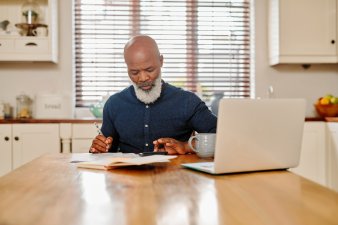 Mature man going over his finances