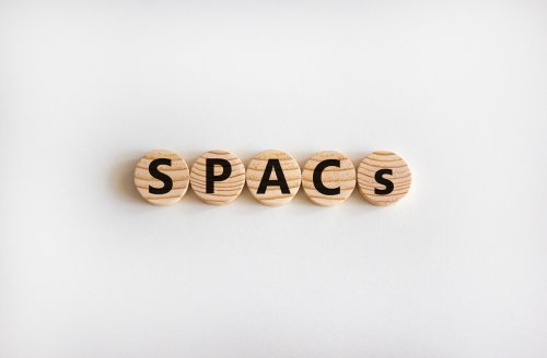 SPACs spelled out on wooden blocks