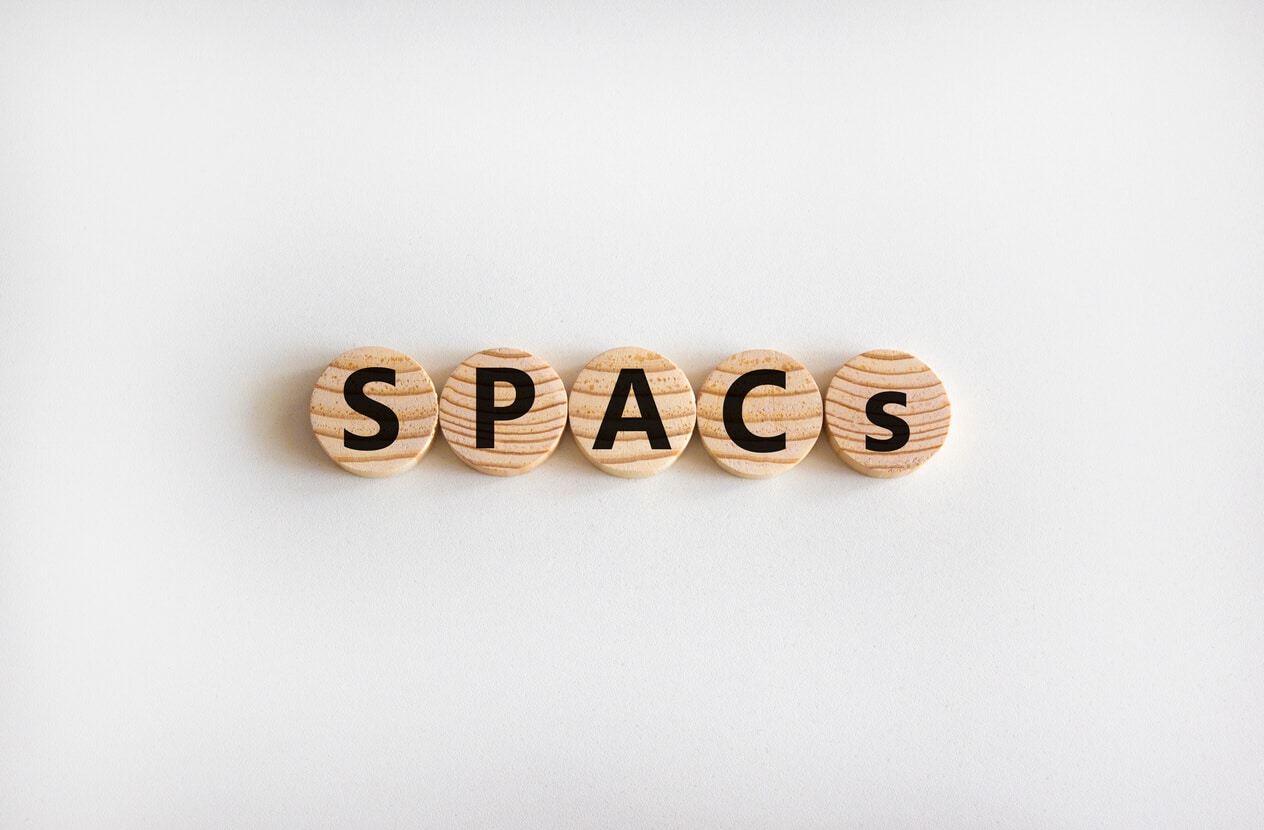 SPACs spelled out on wooden blocks
