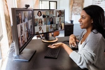Woman presents on a zoom meeting